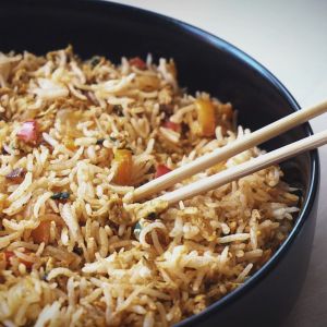 Masala Scrambled Egg Fried Rice in a bowl with chopsticks