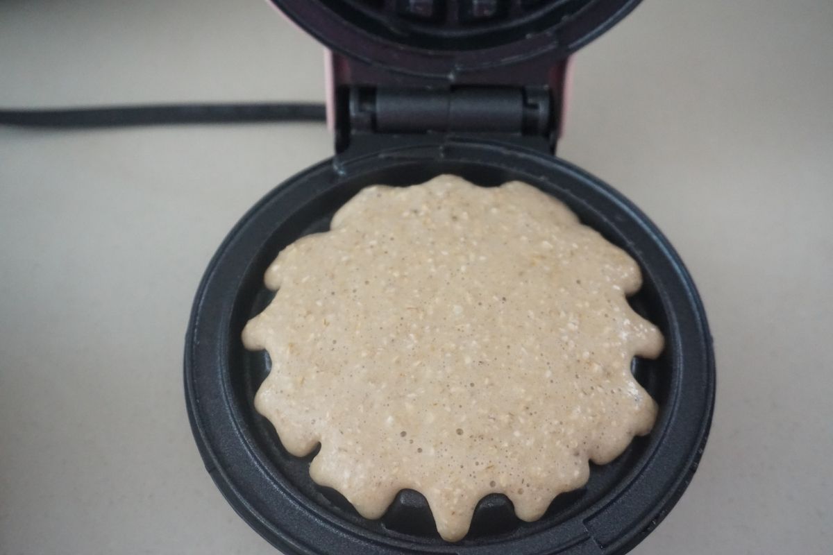 Batter poured in a waffle maker