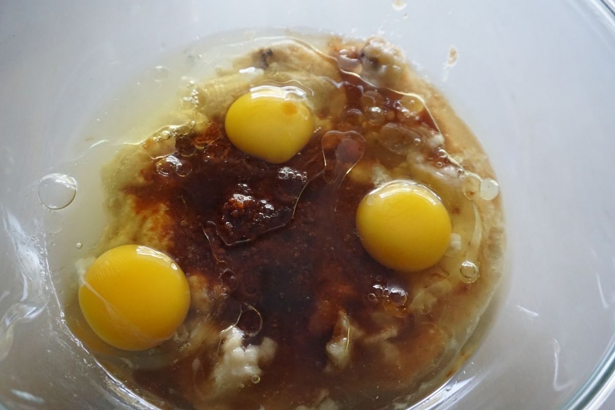 banana egg oil vanilla and jaggery in a bowl