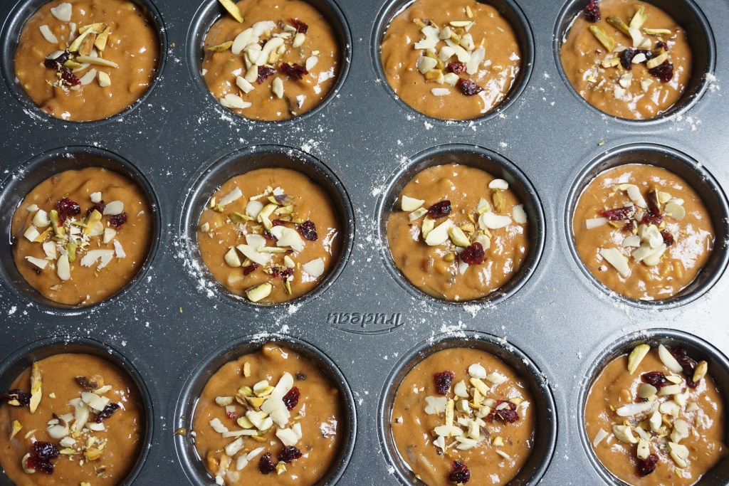 muffin batter topped with nuts