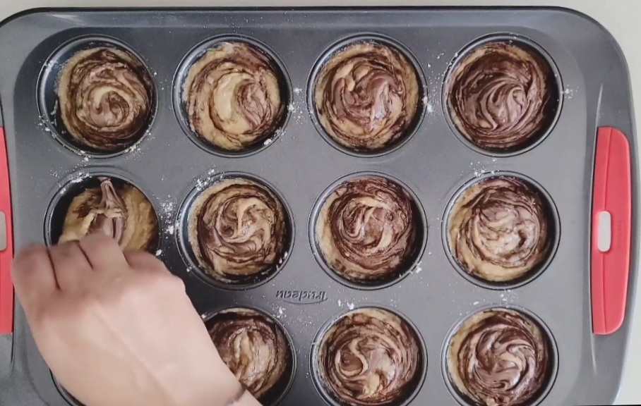 Nutella dollops swirled with a toothpick.
