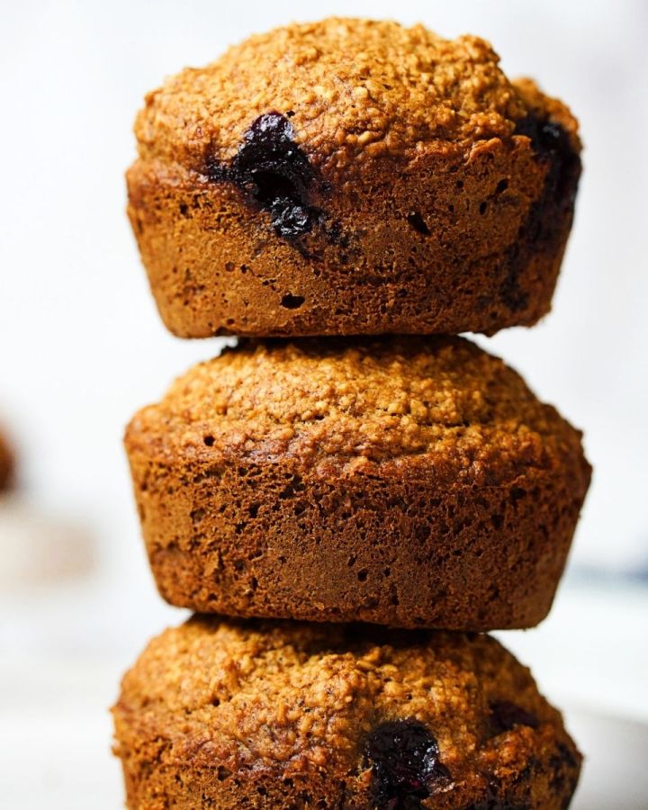 Stack of three banana blueberry oatmeal muffins