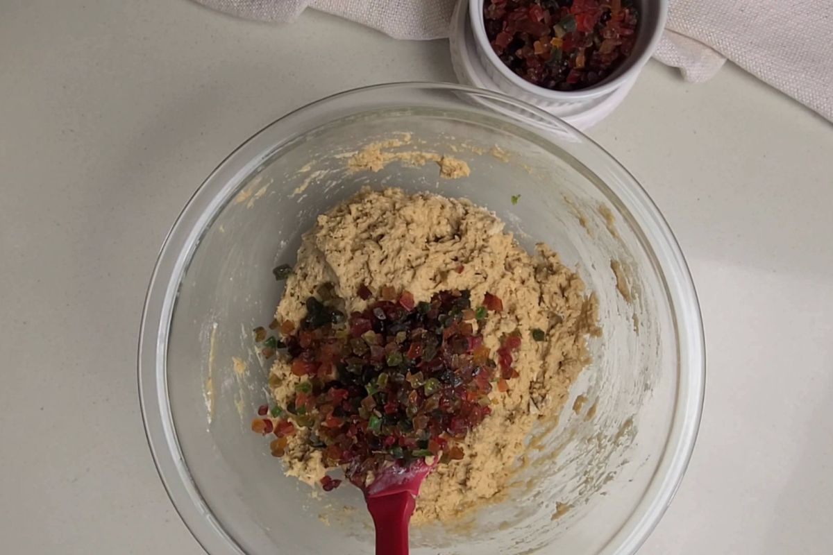 Tutti frutti pieces added to bowl.