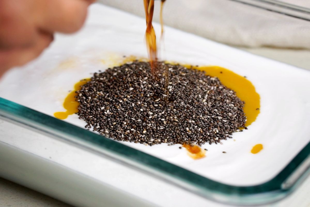 Vanilla extract added to the bowl.